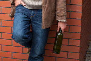 Man Street Corner Struggling with Alcohol Dependence