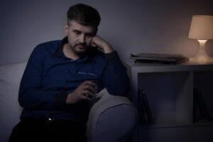 Man Suffering From Symptoms of Alcoholism