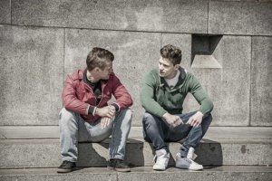 Two Young Men Discussing Alcohol Withdrawal