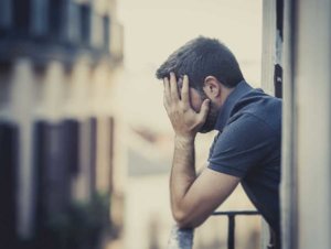 Man Struggling with Harsh Alcohol Effects
