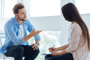 Man Receiving Therapy During Addiction Rehab