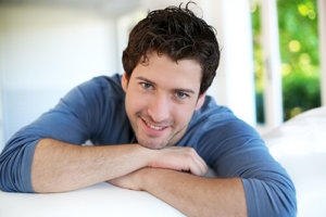 happy man smiling after enrolling in a center for addiction treatment