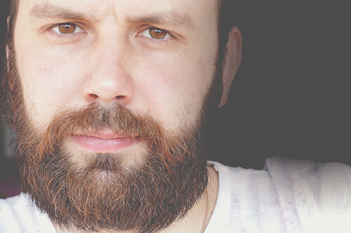 man with beard suffering from crack cocaine addiction