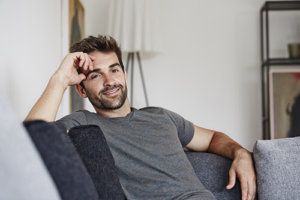 happy man smiling after enrolling in rehab for drug addiction