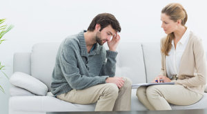 Man on Couch Receiving a Substance Abuse Evaluation
