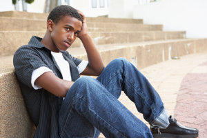 Young Man Wondering, "What Causes Addiction?"