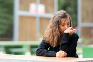 woman wrapped up in the addiction cycle