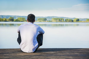 Contemplative Man in Need of Addiction Recovery Rehab