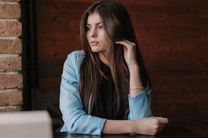 young, attractive woman thinking about the drug abuse statistics 