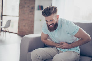 Man Struggling through Harsh Heroin Side Effects