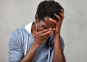 Man Going Through Heroin Withdrawal Symptoms