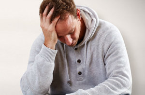 Man Struggling with Symptoms of Alcohol Withdrawal