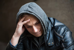 Man Struggling with OxyContin Side Effects