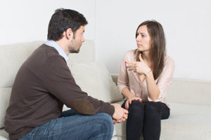 Woman Talking to Therapist During Rehab Treatment