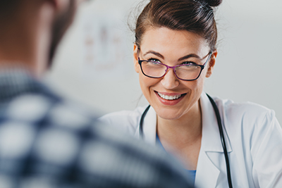 doctor with client at addiction treatment therapy session