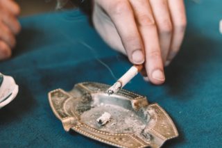 Person holding a cigarrette